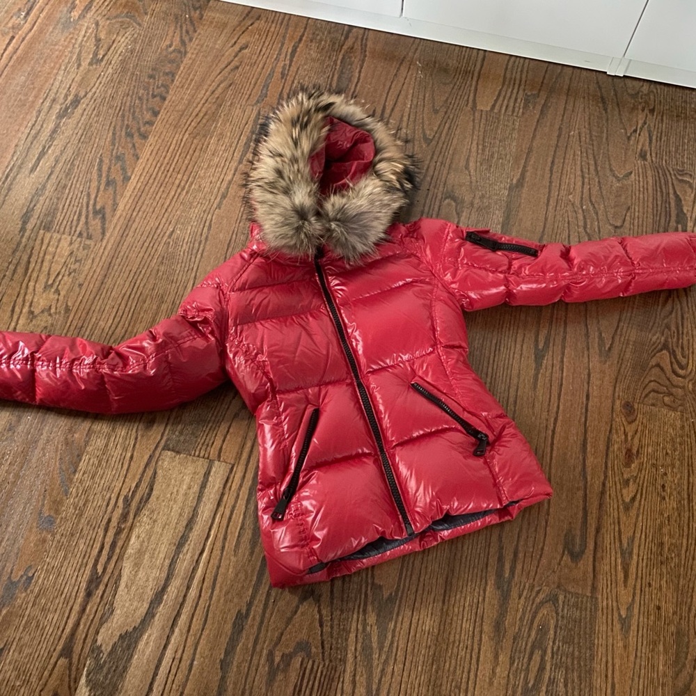 Red SAM jacket with faux fur hood.